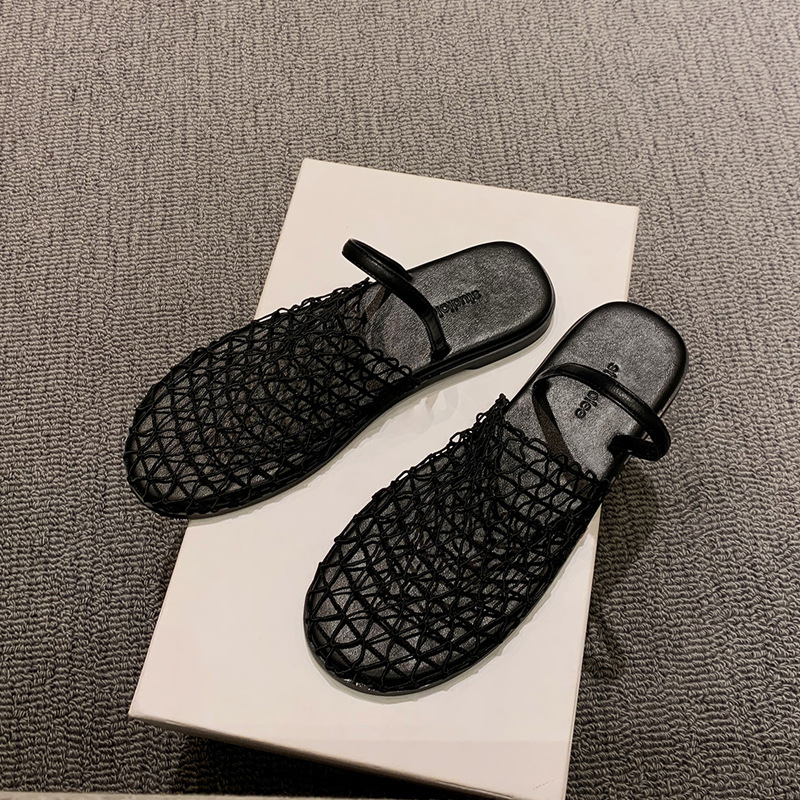 Grava Madre verano nuevo estilo de moda de pan de red hueco con playa de mitad zapatillas de fondo plano para mujeres de verano