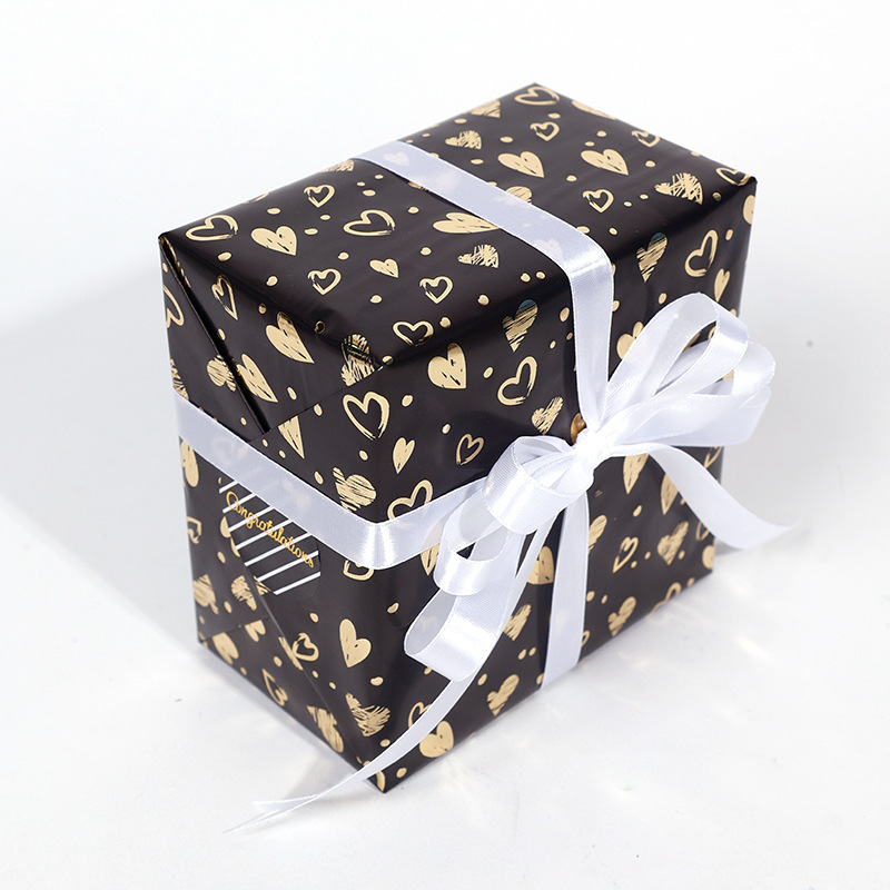 Transfronterizo especial para papel de embalaje de regalo de oro negro, regalo de cumpleaños de San Valentín, papel de regalo de lujo ligero, rollo de gran tamaño