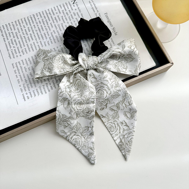 Anillo de cabello de arco femenino retro elegante correa francesa temperamento de alta sensación de impresión de anillo de intestino suave tocado versátil
