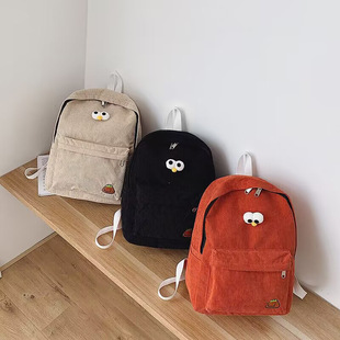 Factory spot simple and lightweight corduroy backpack cute primary school student schoolbag men and women large capacity casual backpack