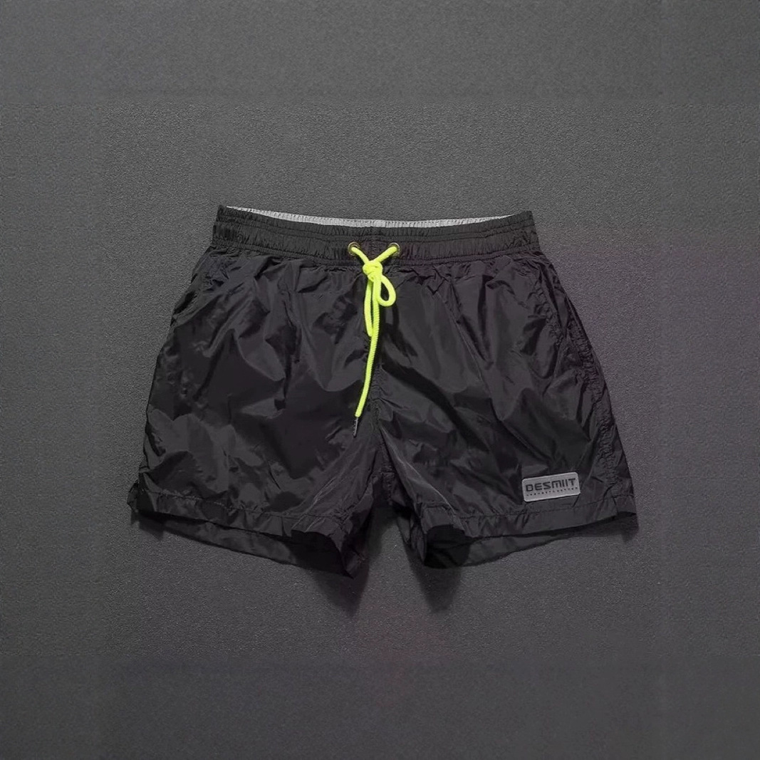 2025 nuevos pantalones cortos casuales para hombres, colores sólidos, simples y neutrales, pantalones de playa impermeables, pantalones de tres puntos de secado rápido para hombres