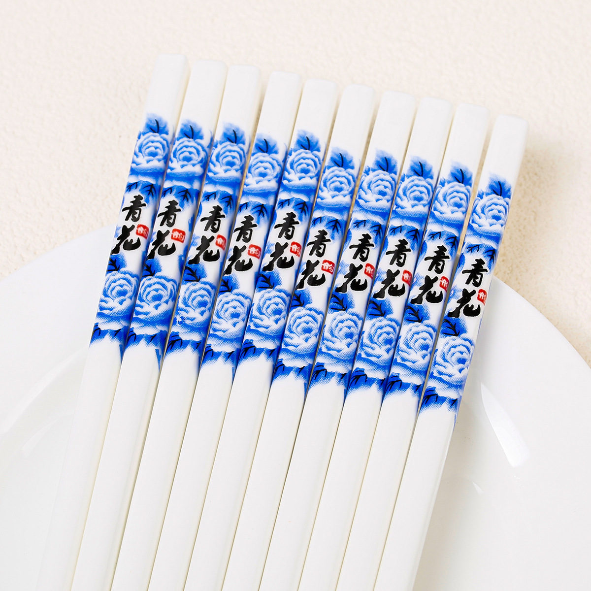 Palillos de cerámica azul y blanco, porcelana blanca, vajilla para el hogar, resistente a altas temperaturas, a prueba de moho y sin deformación, palillos de regalo al por mayor