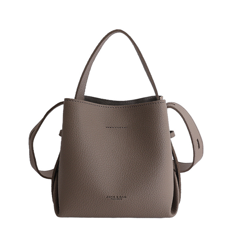 Bolsa de cubo de mano coreana 2026 nuevo nicho diario bolso de cubo bolso de mujer gran capacidad de transporte de viaje mochila