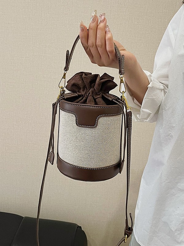 Bolso de mano cilíndrico de color contrastante para mujer, novedad 2026, estilo transfronterizo del Sudeste Asiático, a la moda, bandolera de un solo hombro