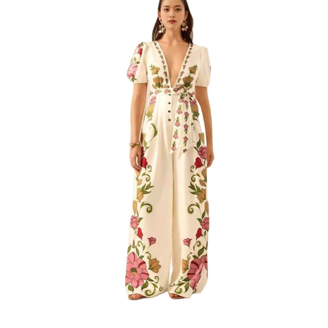 Macacão feminino de verão com decote em V profundo, estampa moderna e calças de pernas largas em estilo europeu e americano, roupa sexy._voghion.com