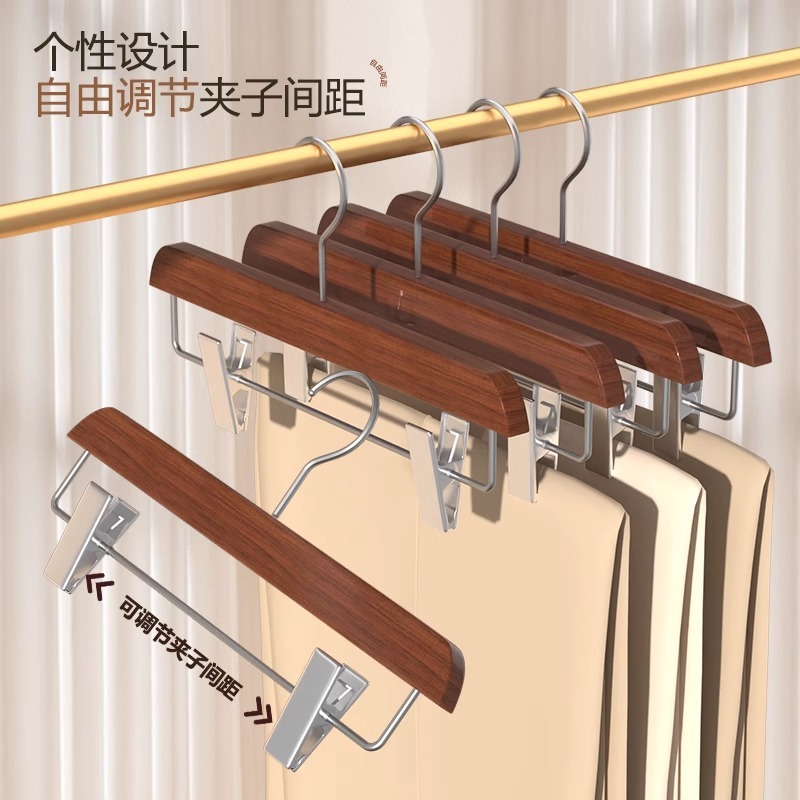 高級な木のズボンのハンガーのズボンは大人の実木の滑り止めの無傷のズボンを挟んで服の店のホテルのズボンのハンガーの卸売りを掛けます。|undefined