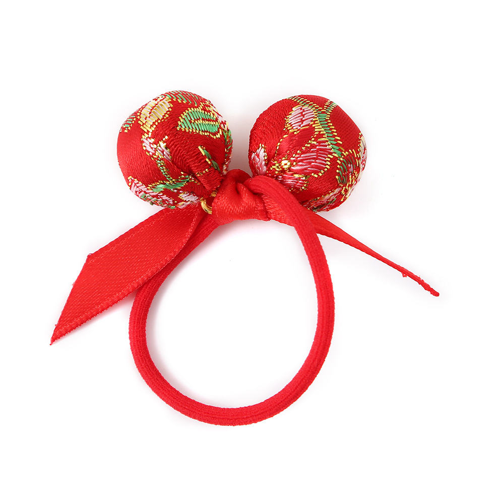 Año Nuevo rojo al por mayor satén espinado para niños anillo de cabello de niña cuerda de atención china cuerda de cabello festiva bola