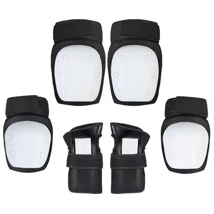 Juego blanco de seis piezas (un par de rodilleras, codos y manos) - peso en código S (20 - 60 kilogramos)