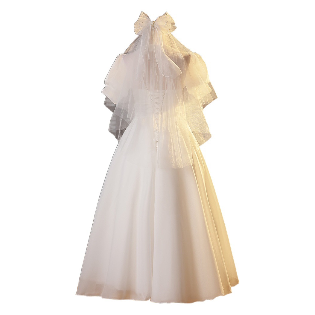 2024 invierno nuevo viaje Retro Luz vestido de novia Hepburn Hong Kong estilo simple moda blanco al aire libre hilado fábrica suministro