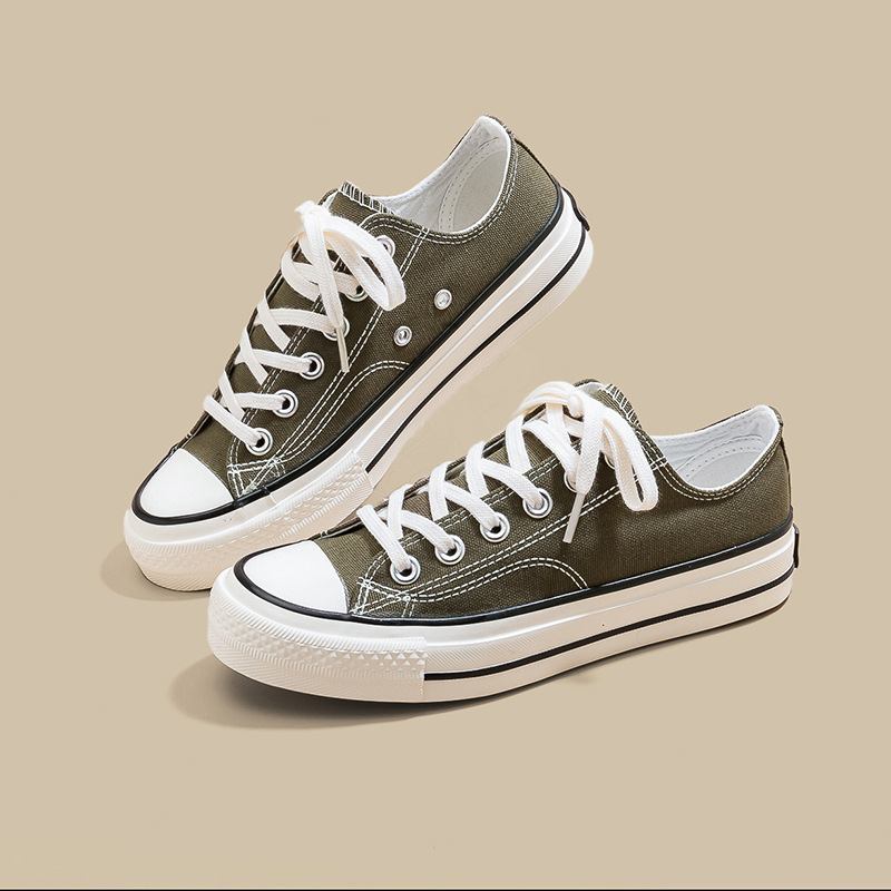 Zapatos de lona de tacón plano de mujer explosión baja estilo de moda coreano versátil estilo clásico retro nicho diseño zapatos de lona blancos image 9