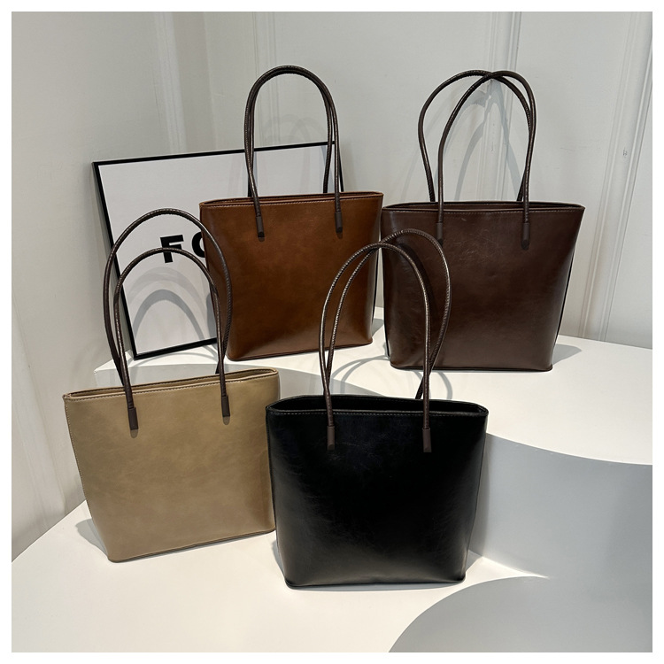 Europa y América simple retro bolsa de cubo de la línea de PU costura bolsa de cercanías bolso de las mujeres hombro bolso de las axilas bolso de las mujeres
