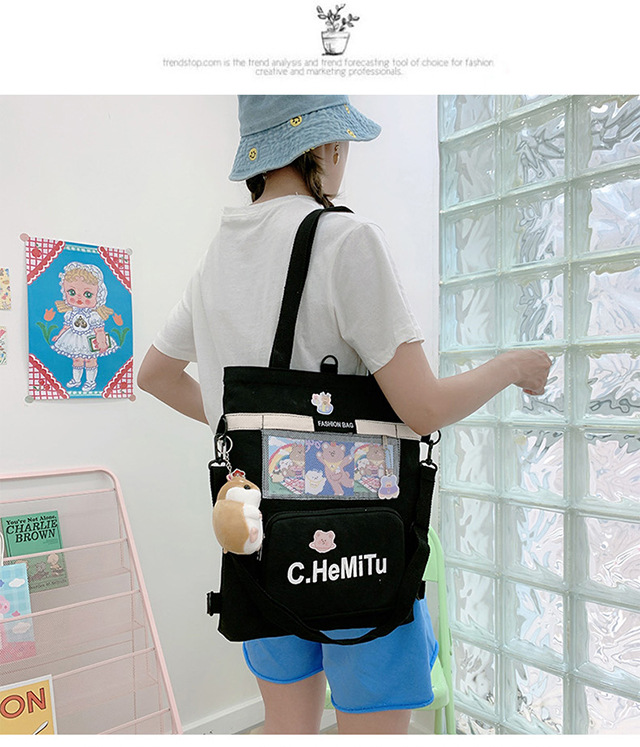 Korean-style canvas bag for girls with one shoulder, in the style of Harajuku, ulzzang, with a large capacity and contrasting colors, is a crossbody hand-held schoolbag for classes undefined