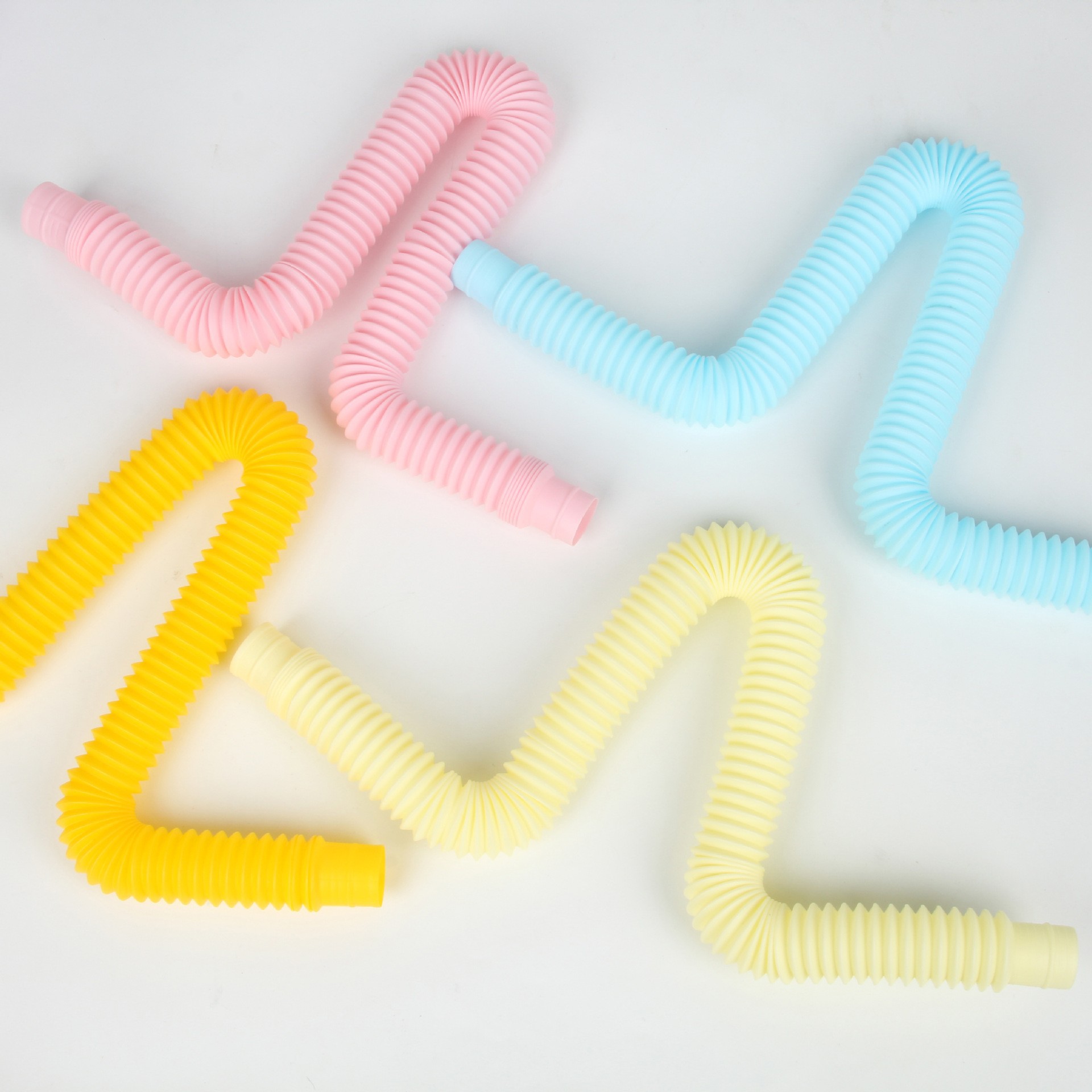 Transfronteriza descompresión juguete pop tubo niños adultos corrugado DIY estiramiento tubo macaron color estiramiento tubo de plástico
