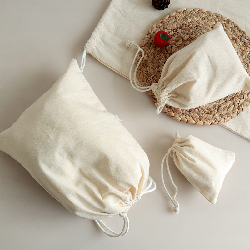 Bolsa de almacenamiento Bolsa de almacenamiento de artículos diversos de punto de fábrica Bolsa de cordón de algodón 22*29cm a prueba de polvo portátil