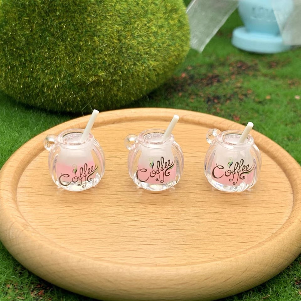 Suministro directo de fábrica de dos colores taza de café luminosa DIY accesorios para el cabello llavero mochila colgante material al por mayor diadema hecha a mano