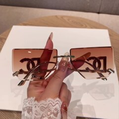 女性用のハイエンドのフレームレスエッジカットサングラス、新しいスタイルのクロスボーダービッグブランド、ハイエンドのメタルサングラス、ファッション用のサンシェード