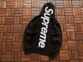 Black with white letters (large letters on the back)