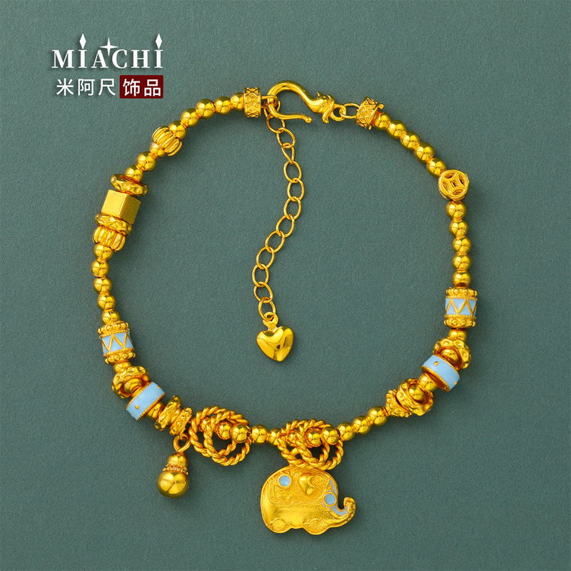 Enamel-colored small elephant and gourd bracelet with light blue spacer beads, featuring a coiled design in a new Chinese-style retro sand gold bead string Enamel-colored small elephant and gourd bracelet with light blue spacer beads, featuring a coiled design in a new Chinese-style retro sand gold bead string