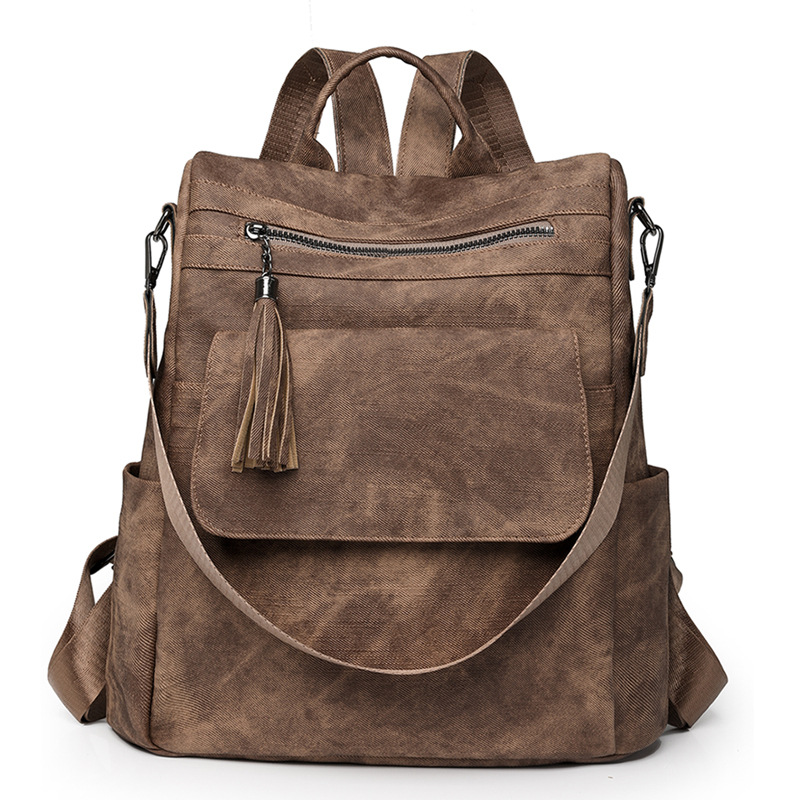 Nuevo estilo mochila mujer 2024 de gran capacidad retro moda borla bandolera viaje de ocio mochila ligera al por mayor