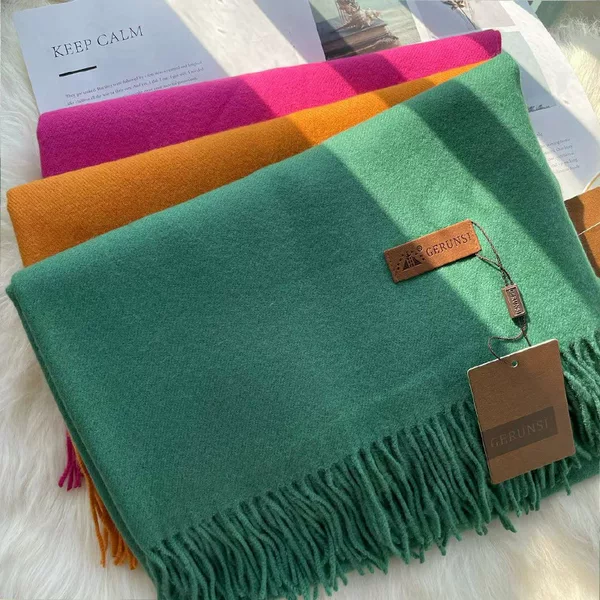 Korean-style solid color basic autumn and winter high-end thickened tassel versatile multi-color couple's scarf with an export vibe