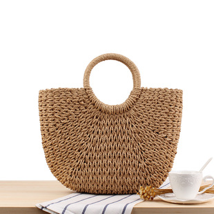 A generation of hair Mori simple hand-carried straw bag solid color casual hand-woven bag summer beach photo trumpet