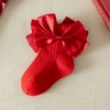 With bow, red