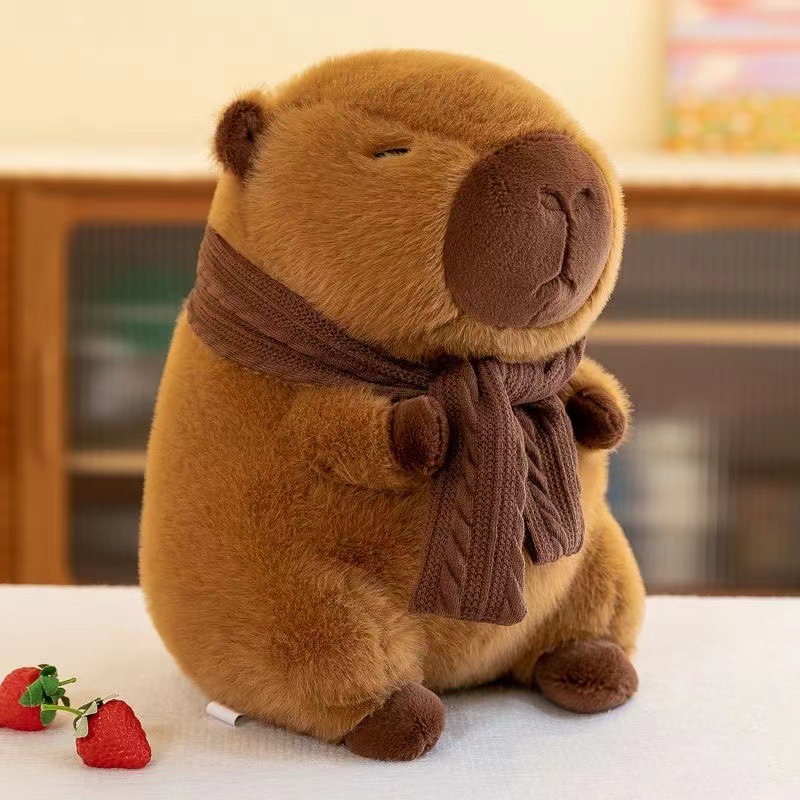 マフラーのカピバラの誕生日の帽子のカピバラの醜い萌えの面白い鼻水のぬいぐるみのぬいぐるみのミンク