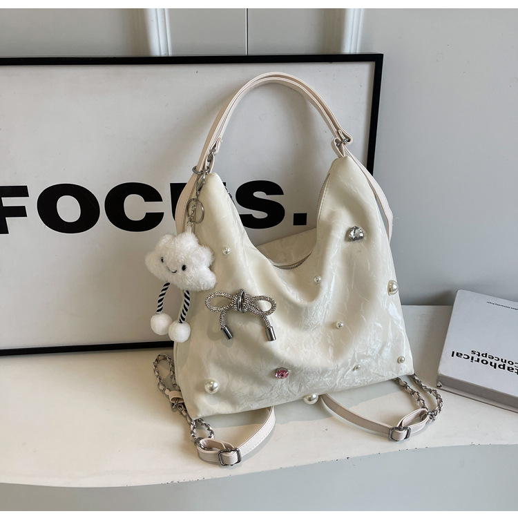 Bolsa de gran capacidad para mujeres 2024 nuevo nicho de alto nivel de diseño de diamantes de viaje multifuncional mochila de doble hombro inclinada
