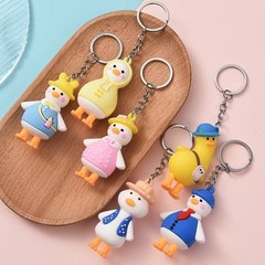 かわいい漫画の頭を傾げるアヒルのキーホルダー、カップルバッグペンダント、子供や学生の新学期ギフト、人形卸売ギフト