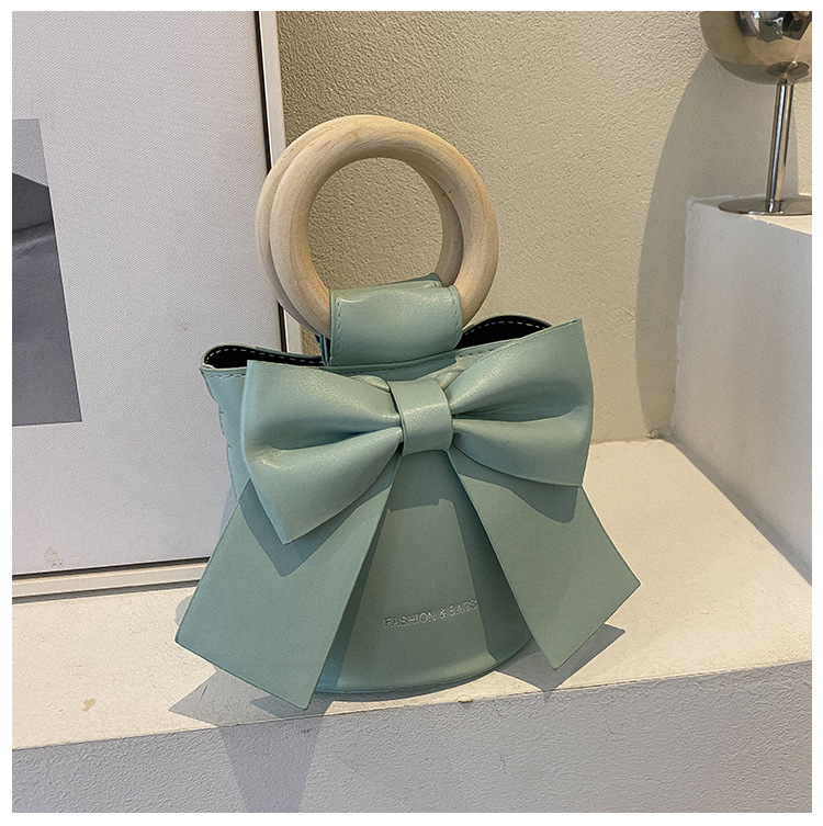 455g Weight Synthetic Leather Lining Material Sewing Thread Fashion Element Magnetic Buckle Closure Type Single Shoulder Strap, Double Handle Strap Type Bucket Bag Bags Type Casual Occasion Pu Leather Material Bow Knot Pattern All Seasons Season Women's Gender Elegant Style Bucket Shape Small Size Women's Small Pu Leather Bow Knot Elegant Sewing Thread Bucket Magnetic Buckle Bucket Bag 22