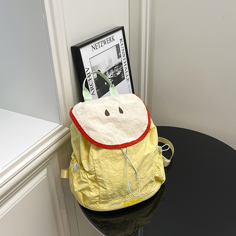 Bolso femenino lindo de alto valor verano 2025 nuevo estilo dopamina dibujos animados fruta mochila casual todo-fósforo
