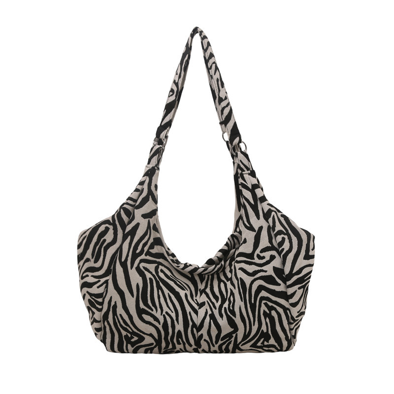 2025 primavera y verano nuevo bolso de tela a cuadros de color bolso de gran capacidad torón de hombro bajo la axila bolso de mujer