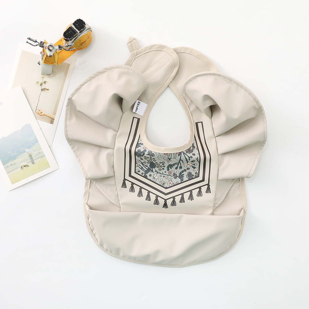 Manga de vuelo danés bebé alimentos babero alas de Ángel babero pu impermeable bebé babero alimentación ins babero