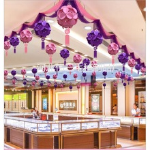 新年國慶珠寶店裝飾吊頂布置周年慶店鋪商場開業波浪旗彩帶布置