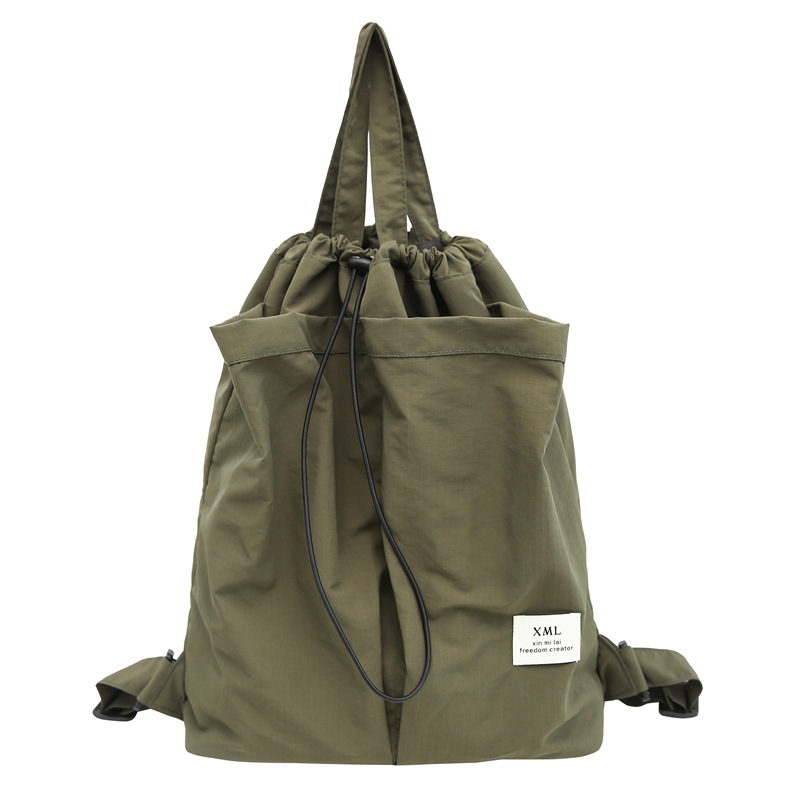 2024 nueva mochila anti-salpicaduras de nailon japonés de nicho, mochila ligera para estudiantes universitarios, mochila de gran capacidad