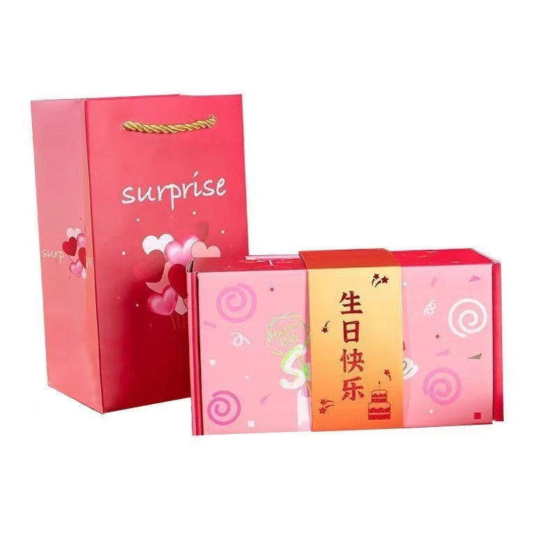 Cruz-frontera nueva Navidad rebotando sobre rojo caja de regalo sorpresa sobre rojo caja de rebote cumpleaños sobre rojo plegable sobre rojo