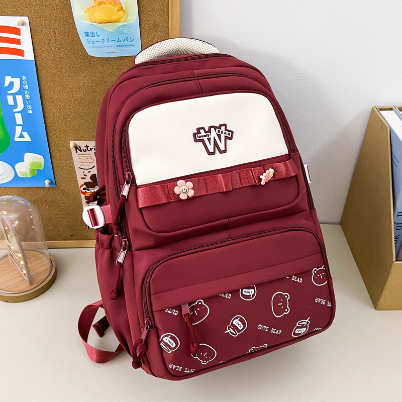 Nueva mochila de hombro simple letras negras con lindos colgantes mochila de carga mochila de gran capacidad