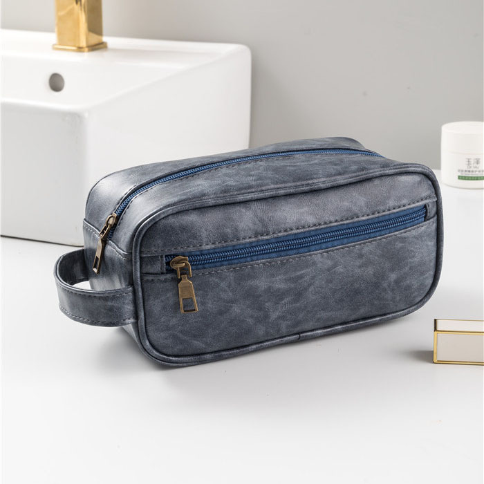 Bolsa de cosméticos de viaje transfronterizo Bolsa de lavado de pu para hombres impermeable Bolsa de lavado portátil de negocios Bolsa de almacenamiento de gran capacidad personalizada