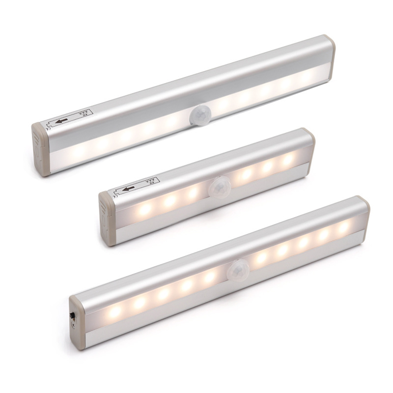 Fuente fabricante recargable luz nocturna luz de sensor de cuerpo humano led inteligente luz de armario de pared luz de armario de succión magnética de batería