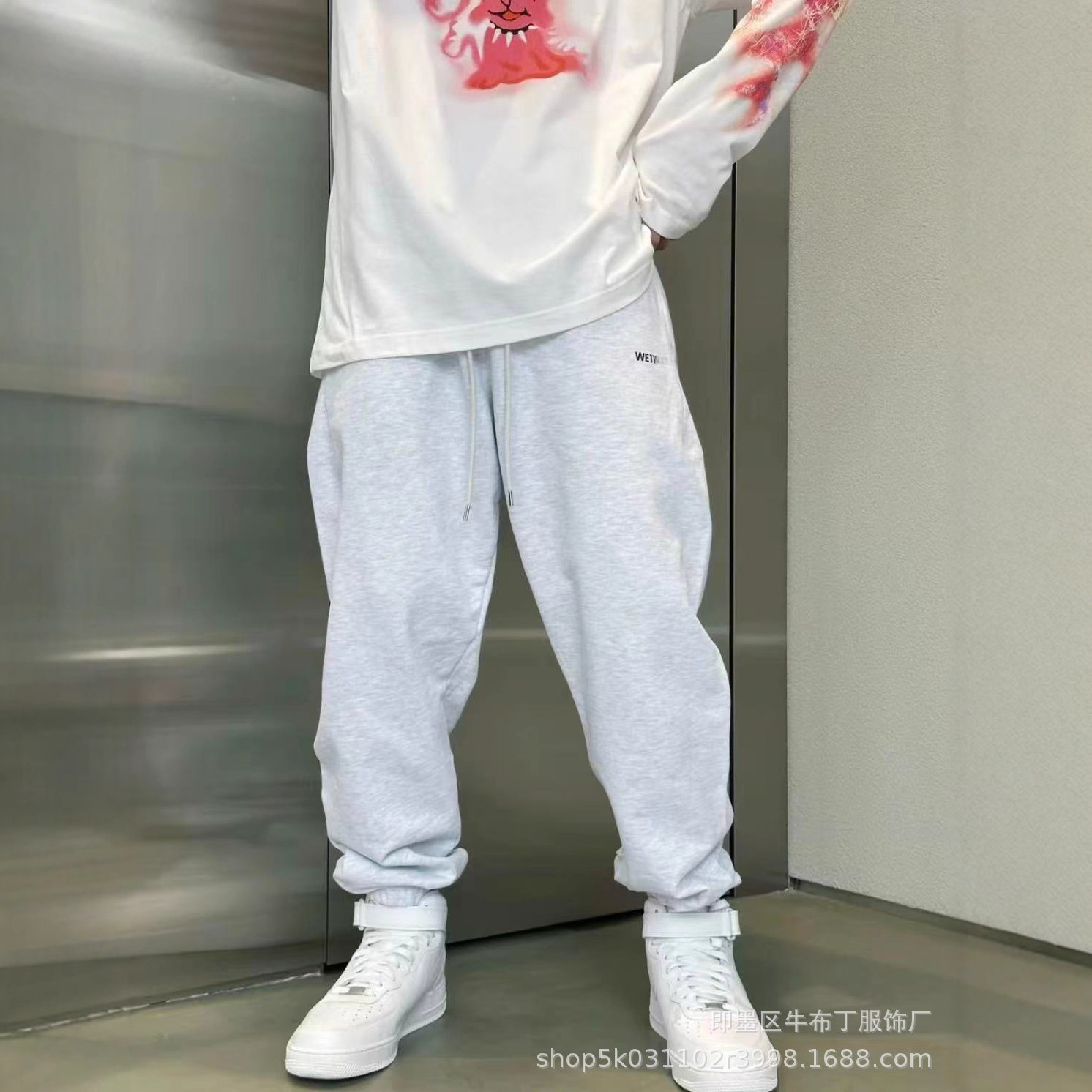 女装新款WE11休闲百搭宽松舒适简约时尚潮流情侣卫裤显瘦女裤子