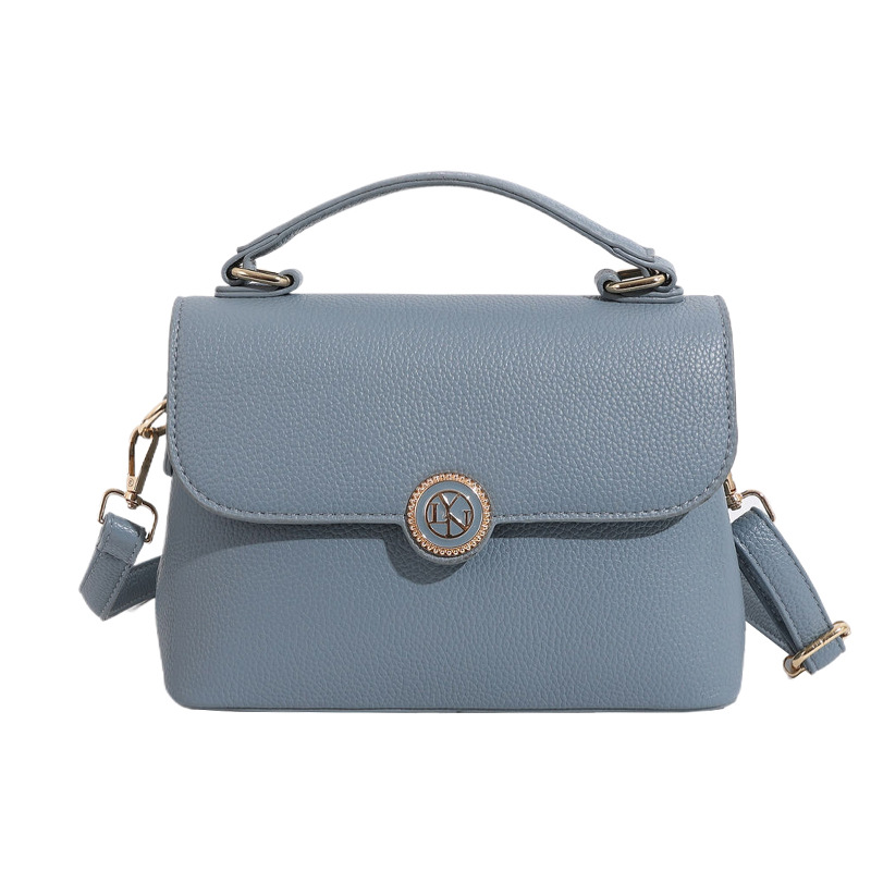 Bolso mujer 2024 nueva textura de moda color sólido bolso de hombro simple estilo occidental color caramelo bolso de mensajero de viaje de viaje