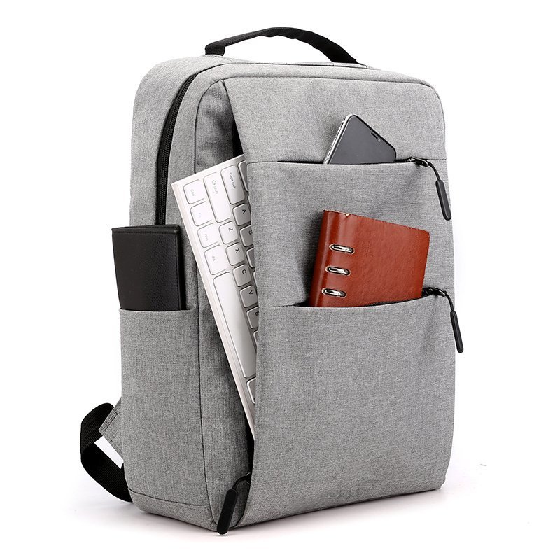 Mochila de comercio exterior para hombres y mujeres mochila recargable USB bolsa de computadora de negocios de 15,6 pulgadas con logotipo impreso mochila escolar de regalo