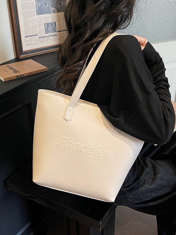Casual gran capacidad bolso tote para mujeres 2026 venta caliente nueva ciudad simple moda versátil bolso de hombro axilar