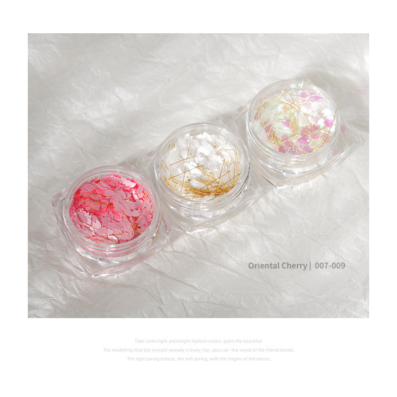 Super Hada pétalo lentejuelas bola de acero hilo de seda material paquete joyería Tiktok red nail art Cerezo flor lentejuelas Aurora