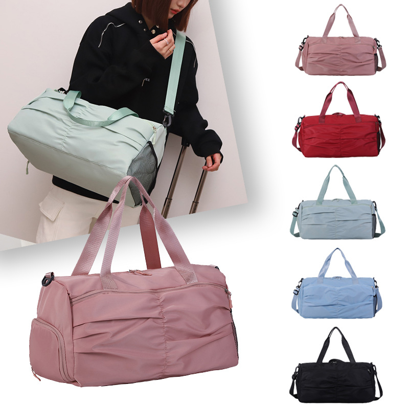 Bolsa de viaje de nicho plisada, bolsa de equipaje de gran capacidad, bolsa de fitness deportiva de alta gama para viajes, bolsa de yoga para mujer