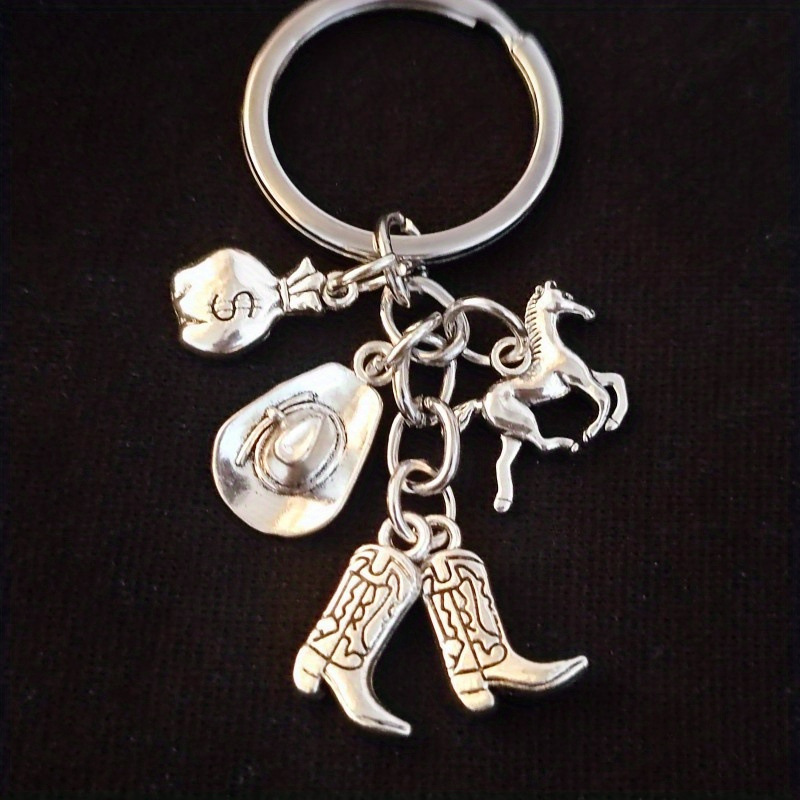 Serie de oro de aleación de venta transfronteriza caliente fútbol béisbol rugby sombrero hechicero puño llavero colgante mochila
