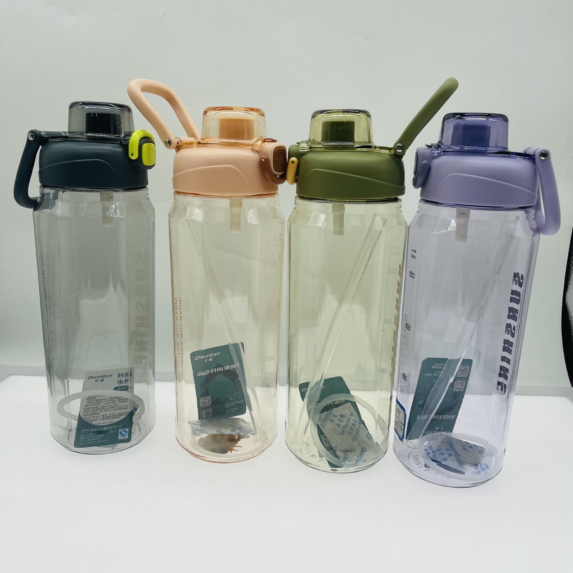 Zhengye 1519 nueva llegada PC plástico taza de agua 920ml gran capacidad deportes taza al aire libre portátil espacio taza