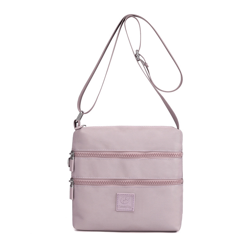 Bolsos de tela pequeños al por mayor, bolsos de nylon, bolsos de hombro para mujeres, tendencia coreana, mochilas ligeras al aire libre, bolsos de tela prácticos de varias capas