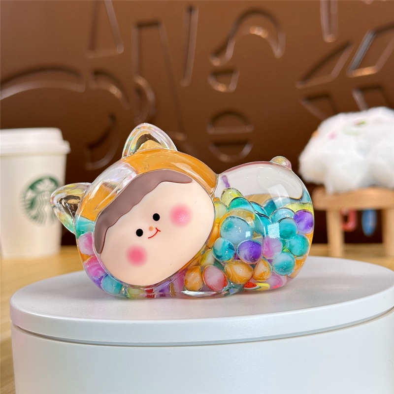 Nocturno explosivo gato macarón super lindo dibujos animados arena flotante en aceite caja ciega pequeña bolsa ciega adornos al por mayor