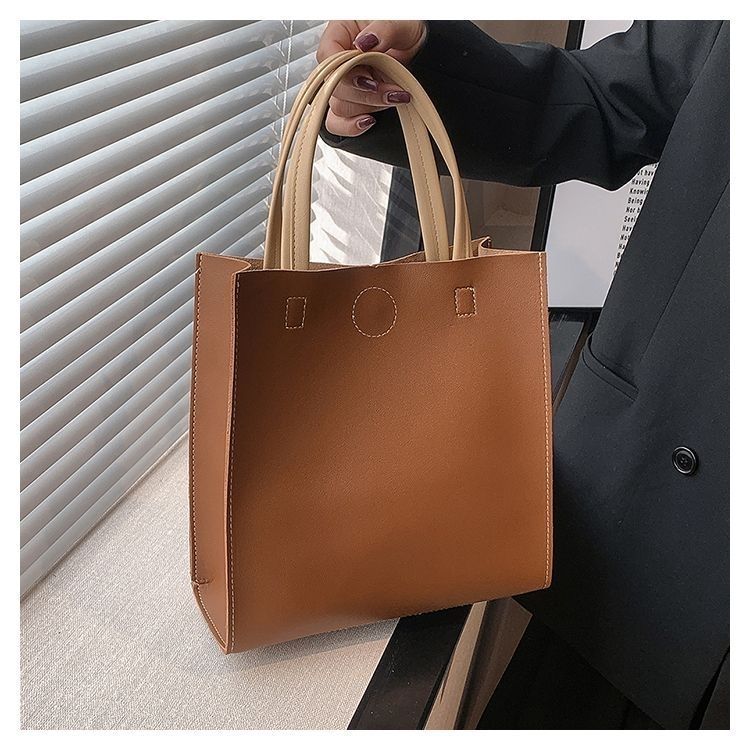 2024 New Bags Korean Version Versatile Commuting Bags Large Capacity Portable Tote Bag Temperament Popular Women’s Bag Vertical Style_voghion.com